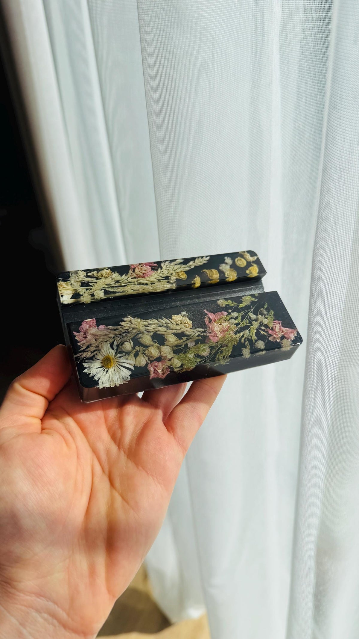 Phone holder with pressed flowers