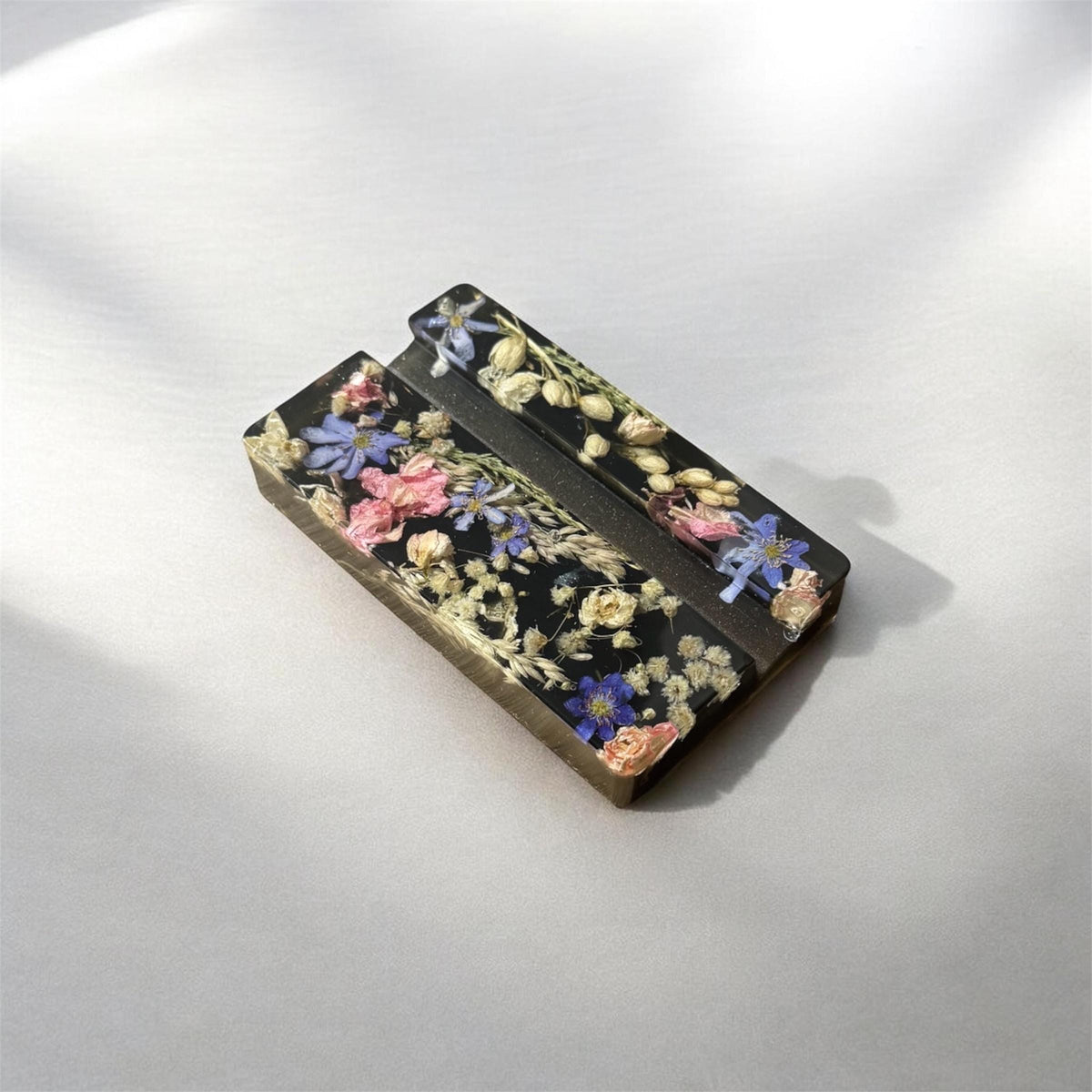 Floral resin phone stand