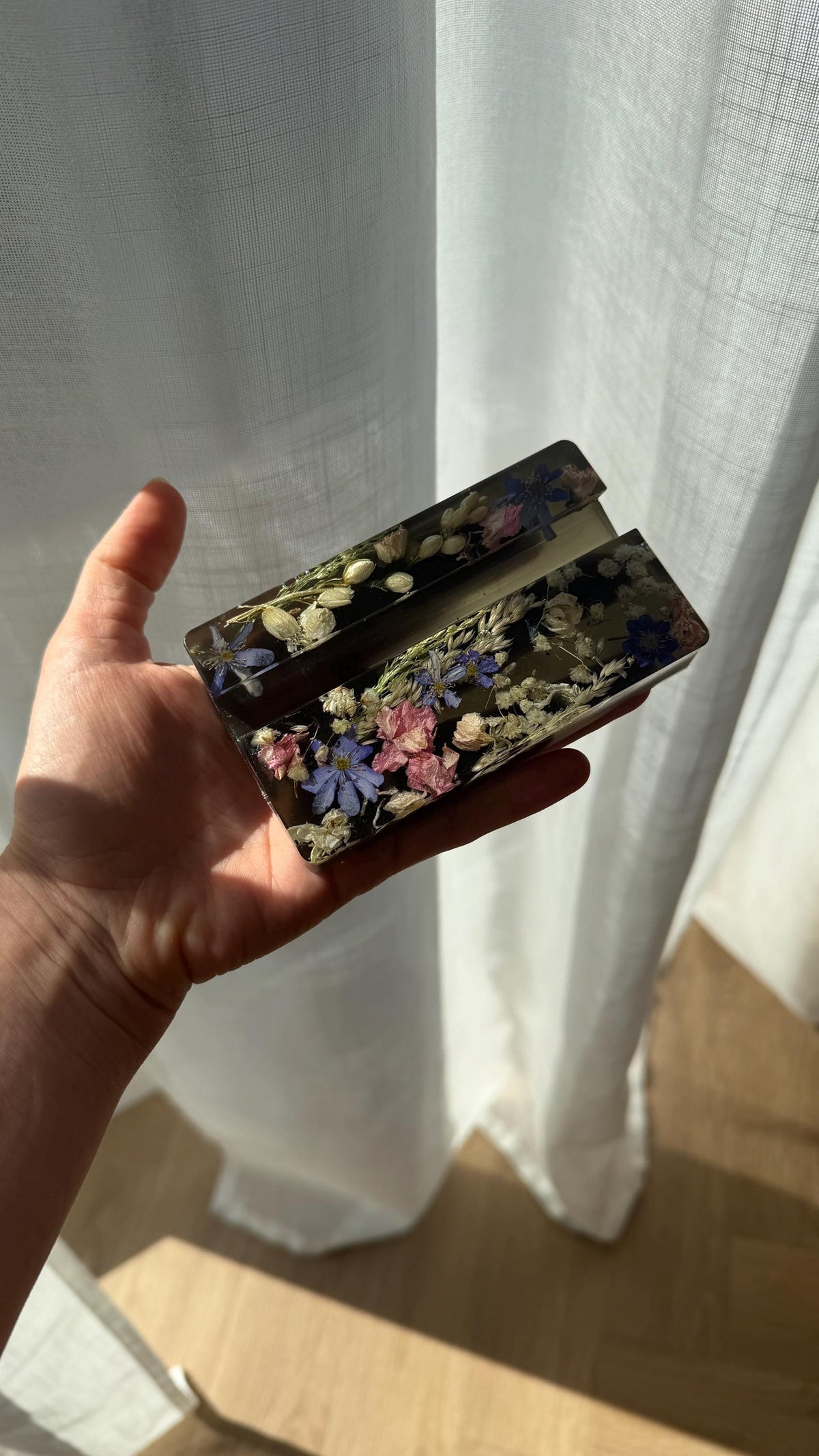 Dried flower phone holder side view